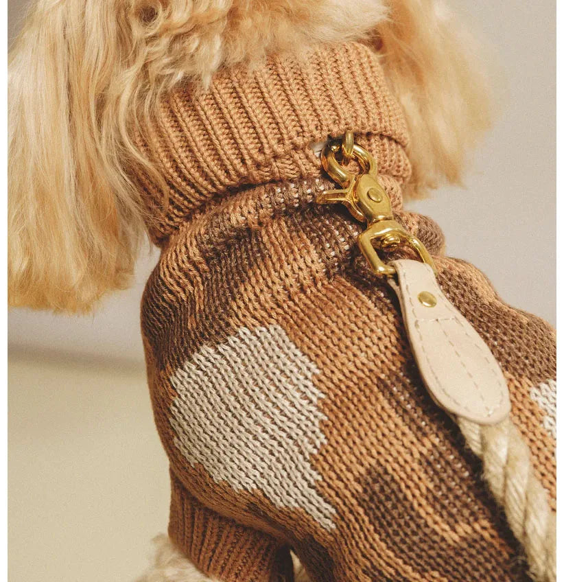 Close-up of the caramel cotton turtleneck with a leash attached