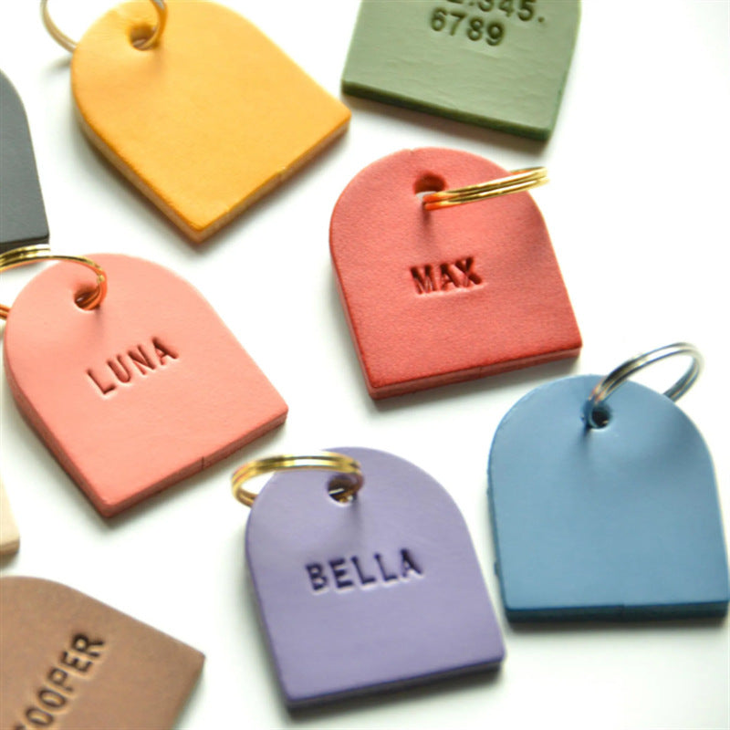 Leather name charms on gold-tone rings