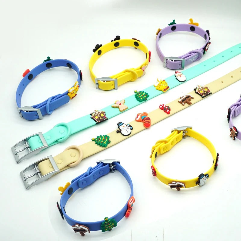 Dog collars in blue, yellow, lavender, mint and sand styled with holiday collar charms